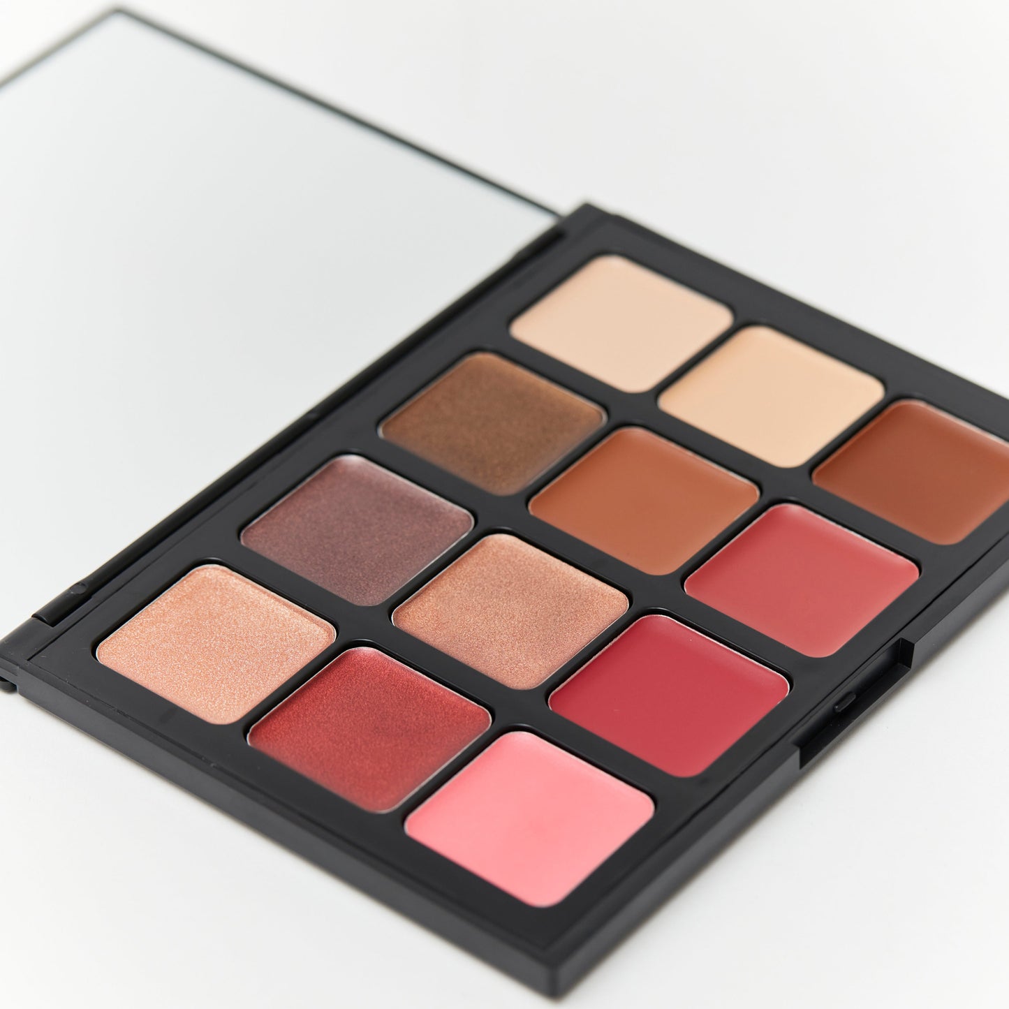 Hub for Belle cream all in one makeup palette with bronzer, blush, eyeshadow, concealer and highlighter creams for quick application