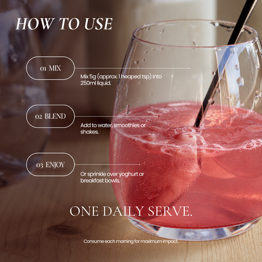 Woman stirring the Hub for Belle Beauty & Wellbeing Blend into a glass of water