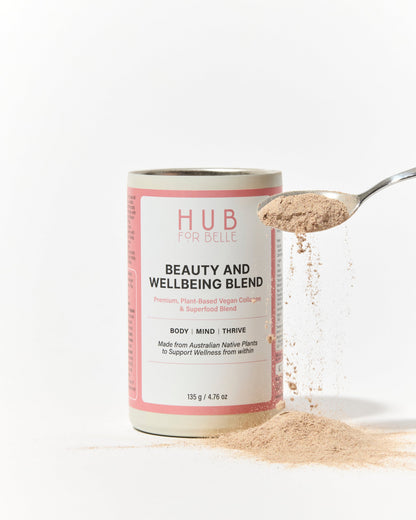 Hub for Belle Beauty and Wellbeing Blend container 2026 Organic beauty winner with spoonful of powder on a white background