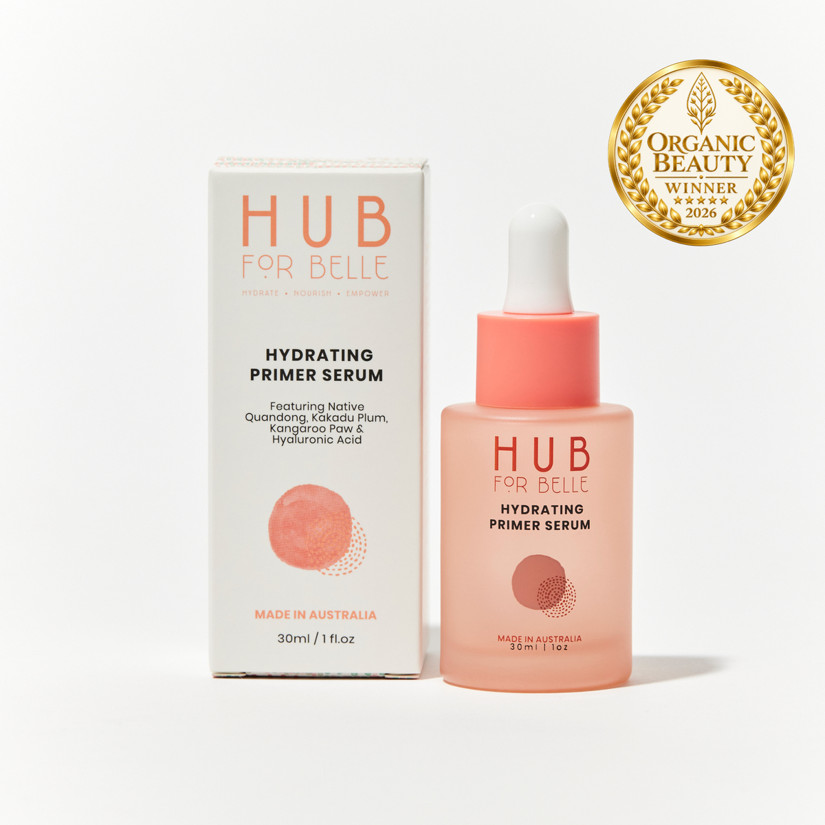 Hub For Belle Hydrating Primer Serum shown with its white and coral packaging box and a dropper bottle, alongside an Organic Beauty Winner 2026 badge on a clean white background.
